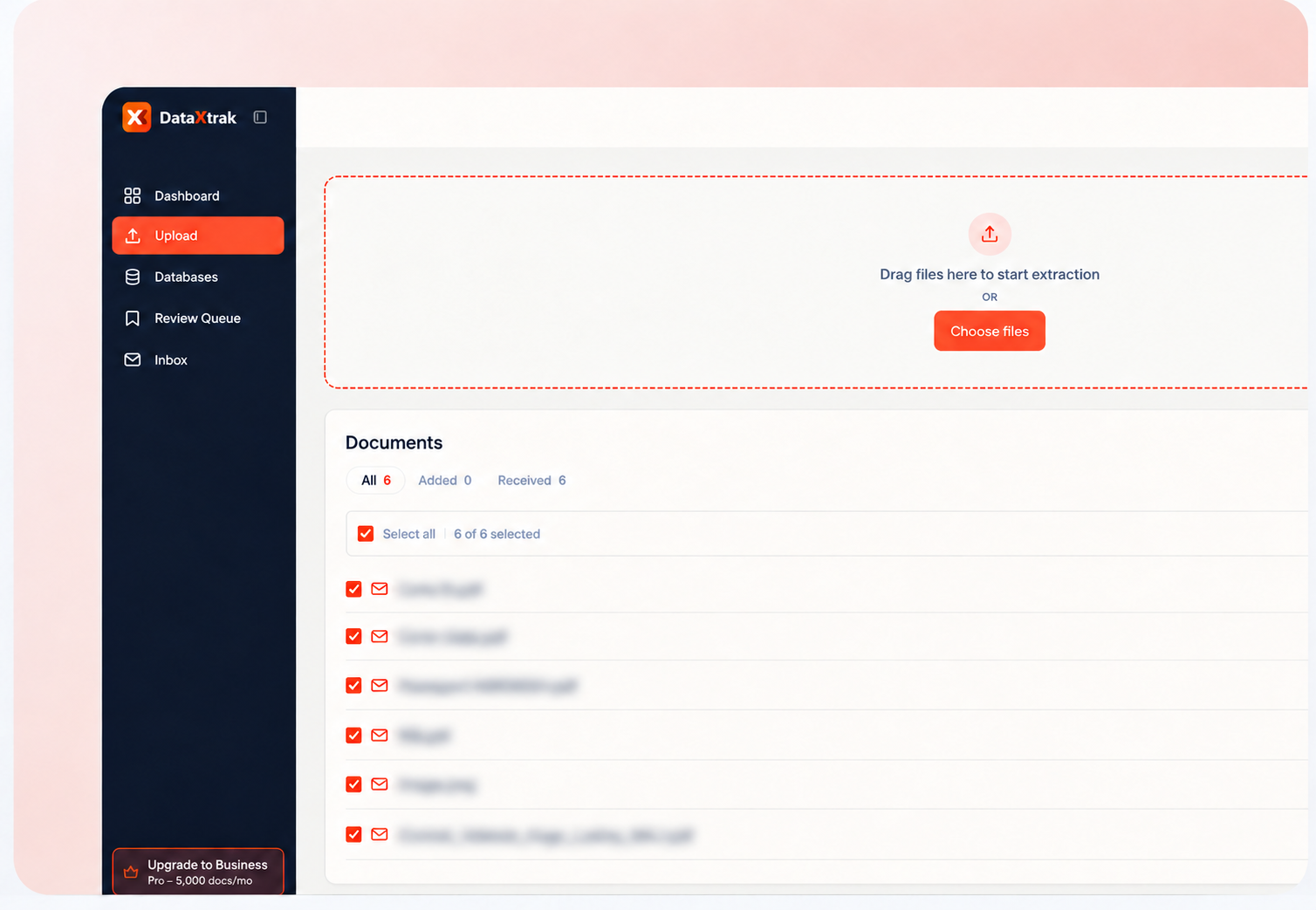 The upload screen with a drop zone above a list of extracted documents.